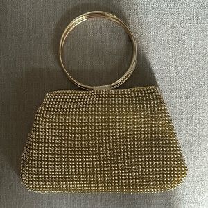New gold hand bag